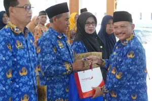 usia pensiun